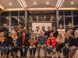 Iwu Utomo and Peter McDonald with field coordinators and interviewers