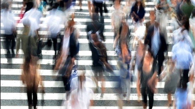 Photo of people crossing the street